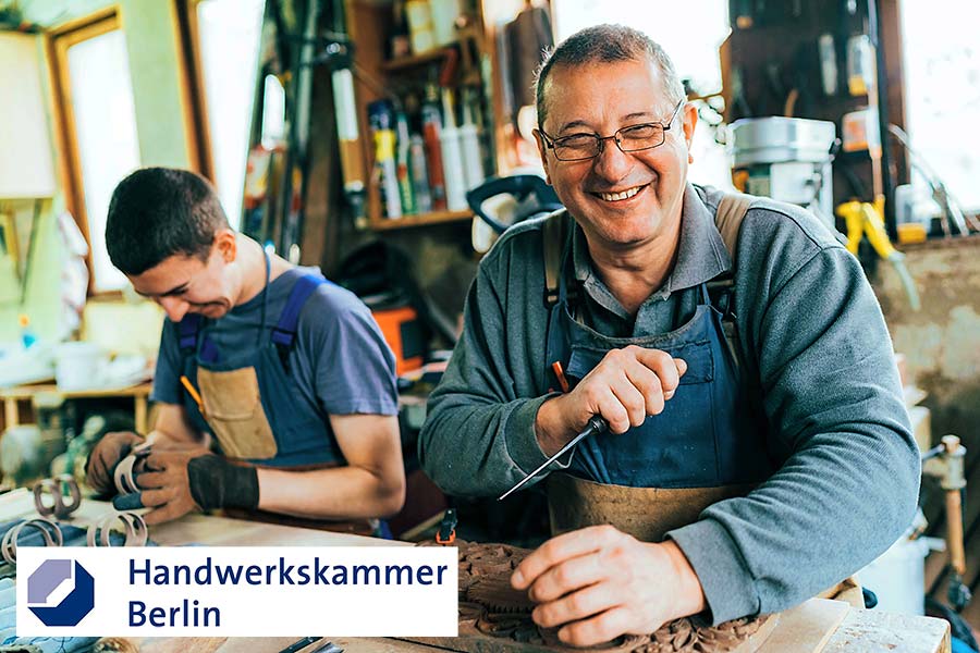 Handwerker bei der Arbeit: Betriebsnachfolge im Handwerk